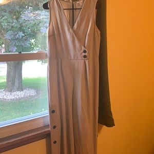 Tan full length jumpsuit size medium with buttons